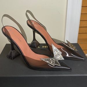 Amina Muaddi timed clear sling backs